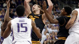  Aziz N'Diaye converted a three-point play off an offensive rebound with  seconds left, Andrew Andrews led Washington with  points off the bench and the Huskies held off Arizona State - on Saturday night despite  points from Sun Devils' freshman Jahii Carson.
